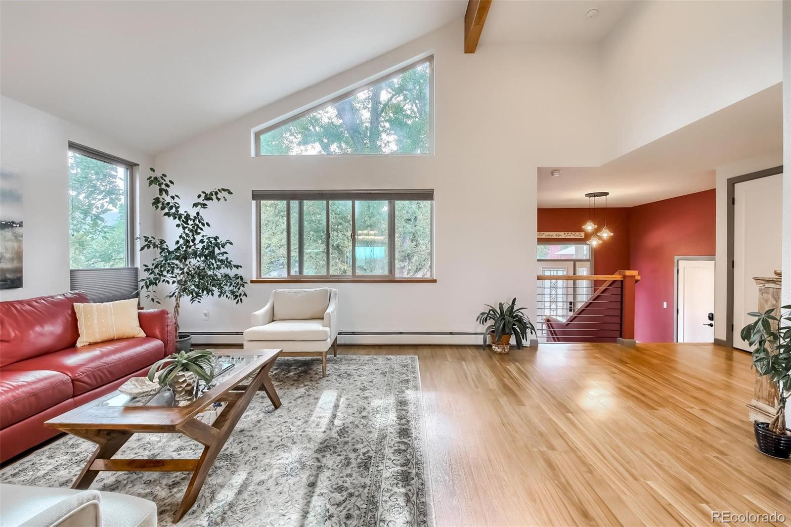 1320 Chambers Drive Boulder, CO 80305 - Photo 5 of 39 a living room with furniture and a large window
