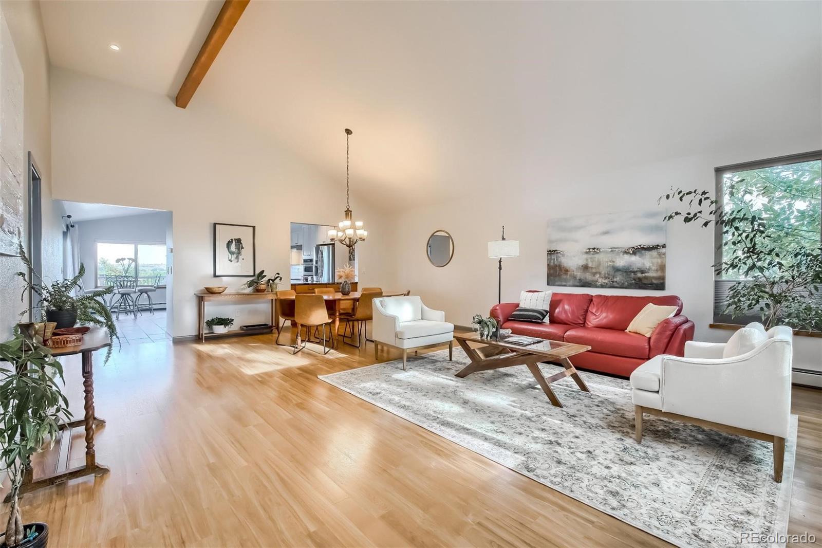 1320 Chambers Drive Boulder, CO 80305 - Photo 8 of 39 a living room with furniture and wooden floor