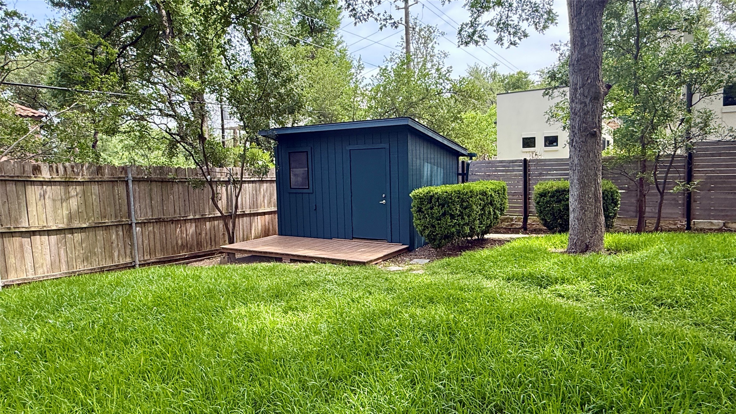 405 Ridgewood Road Austin, TX 78746 - Photo 18 of 22 Backyard Casita with a small wood-finish deck perfect for home office