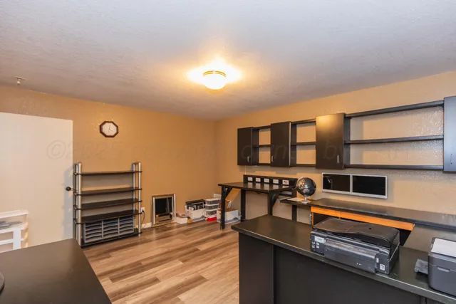 a kitchen with stainless steel appliances granite countertop a stove and a sink