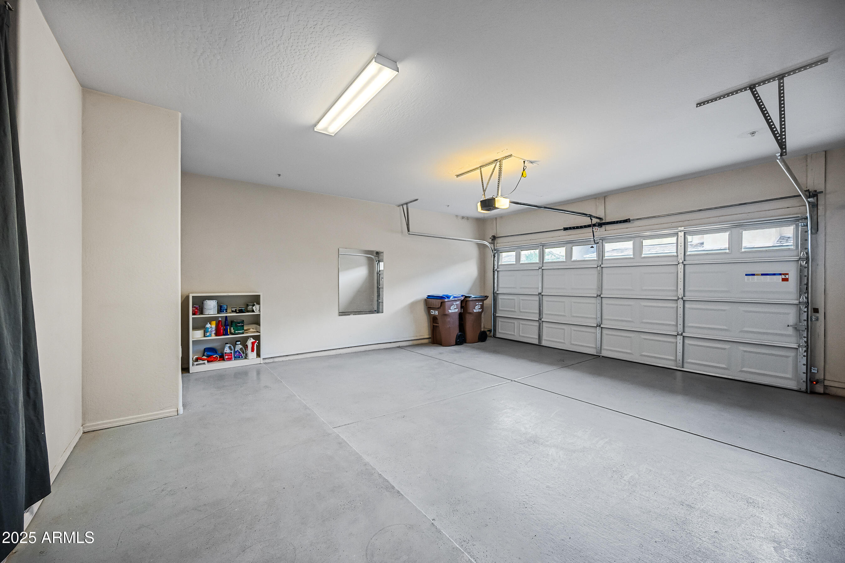 705 West Queen Creek Road, Unit 1079 Chandler, AZ 85248 - Photo 27 of 28 a view of a garage