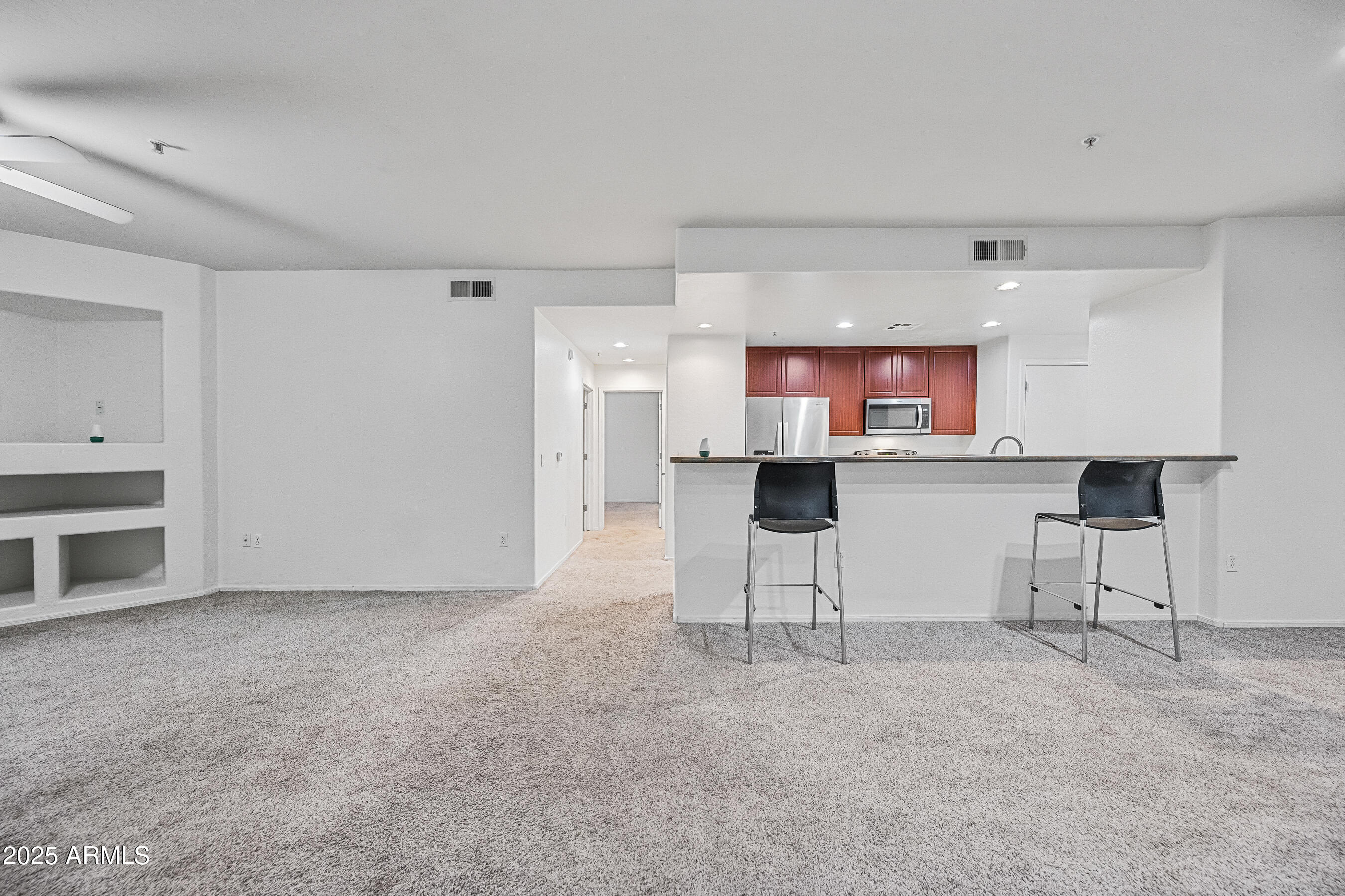 705 West Queen Creek Road, Unit 1079 Chandler, AZ 85248 - Photo 4 of 28 a view of kitchen with furniture and window