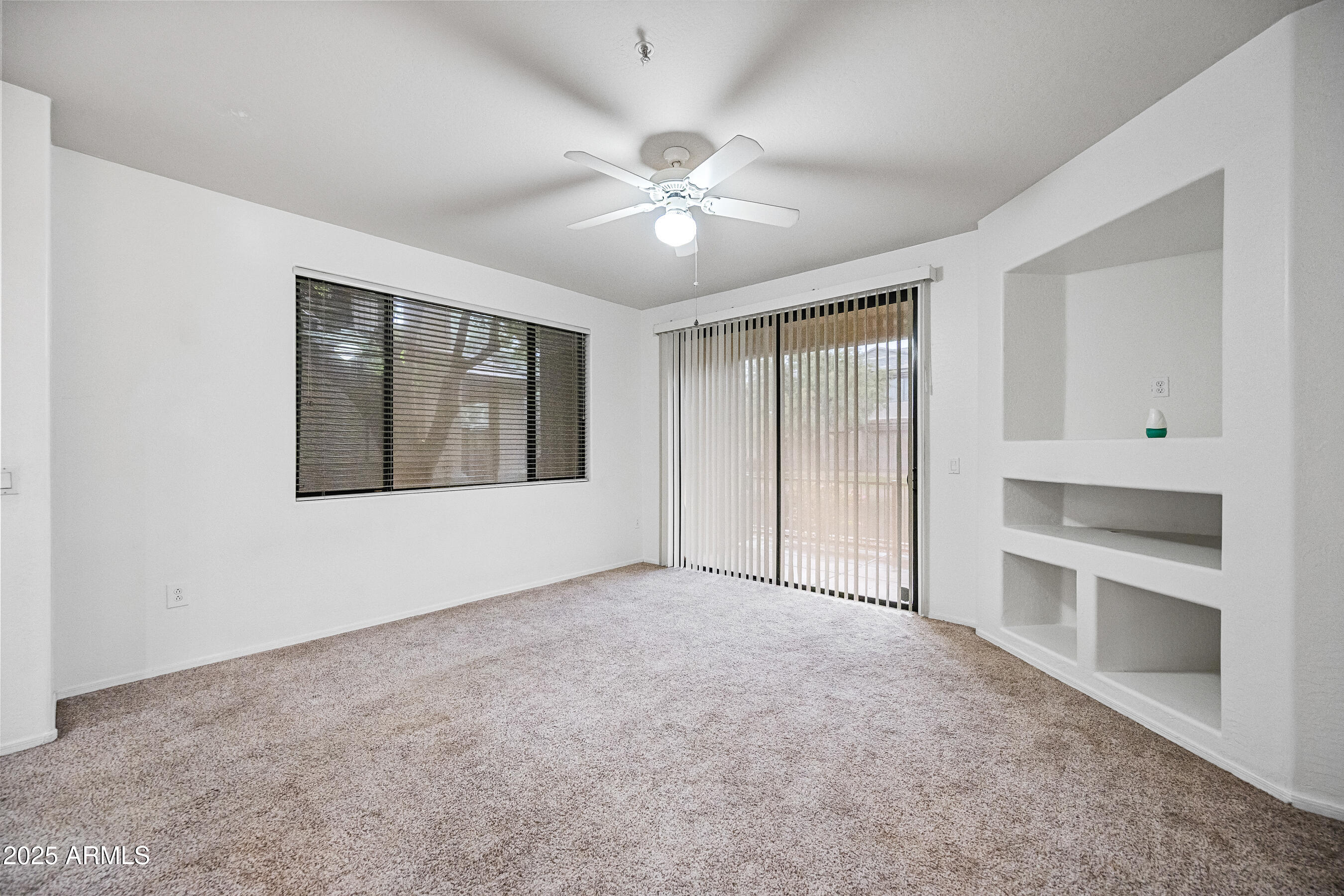 705 West Queen Creek Road, Unit 1079 Chandler, AZ 85248 - Photo 6 of 28 a view of an empty room with a window
