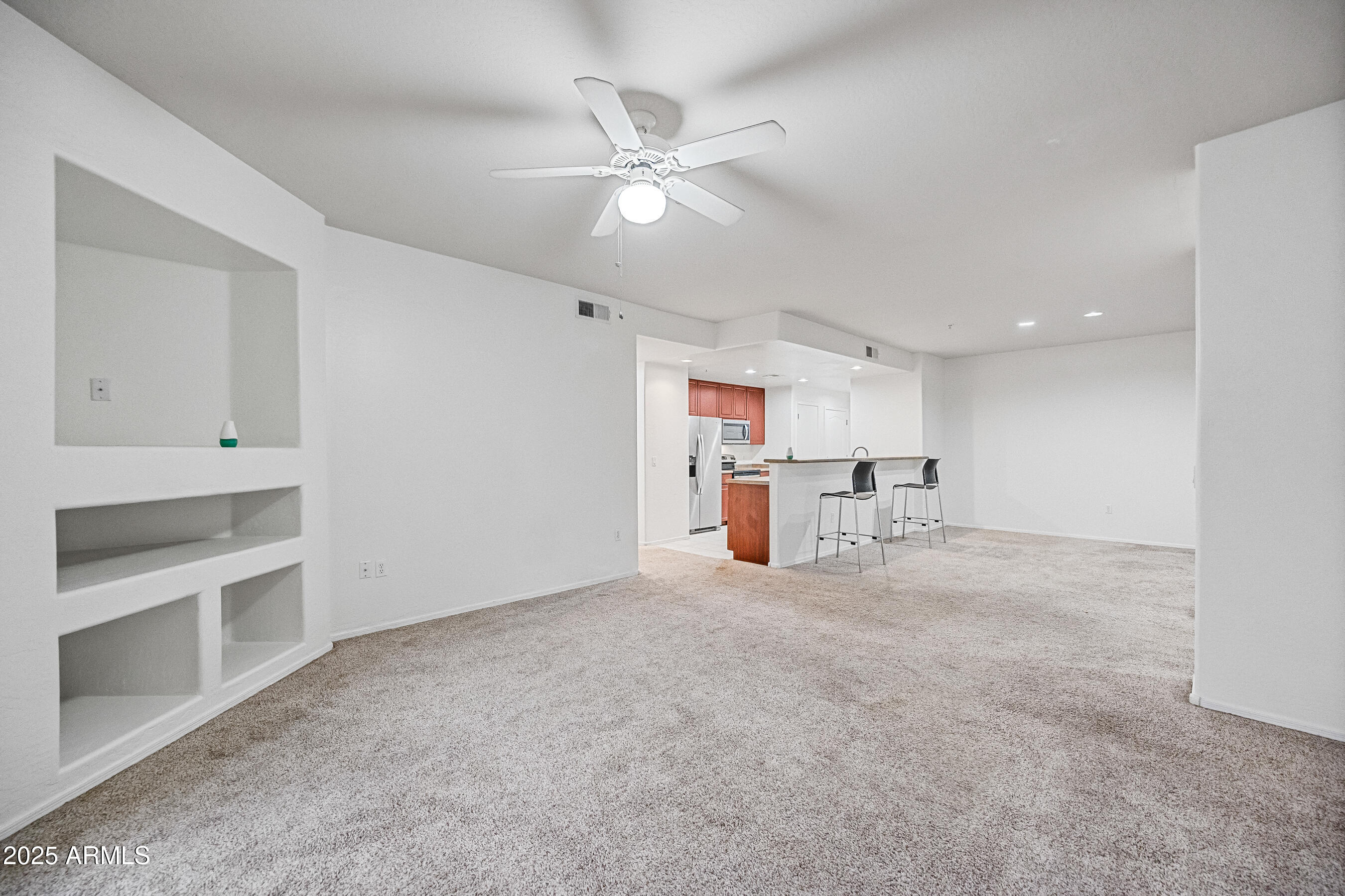 705 West Queen Creek Road, Unit 1079 Chandler, AZ 85248 - Photo 9 of 28 a view of kitchen and kitchen with sink