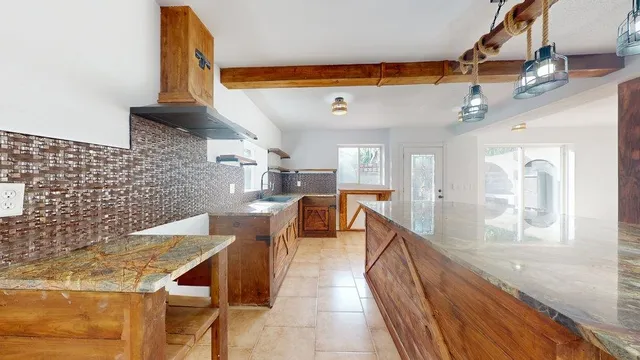 a view of a living room with a sink