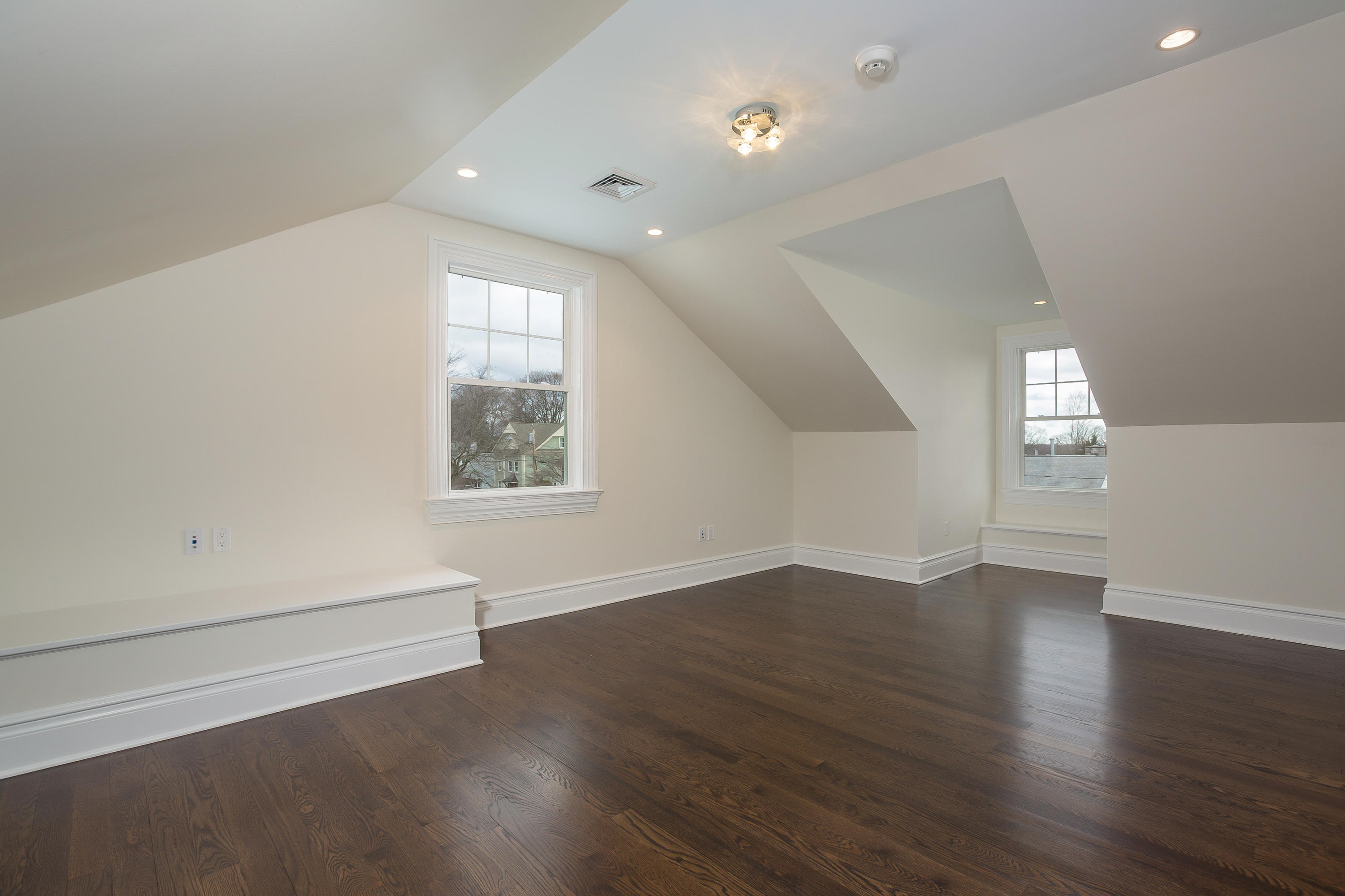 30 Albin Road Stamford, CT 06902 - Photo 32 of 38 an empty room with wooden floor and windows