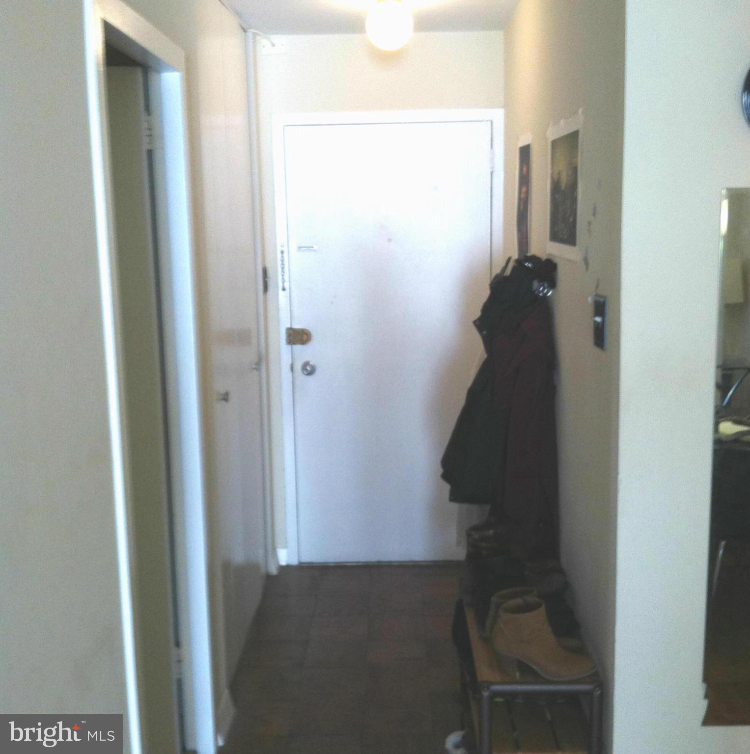 2201 L Street Northwest, Unit 820 Washington, DC 20037 - Photo 2 of 12 a bathroom with a mirror