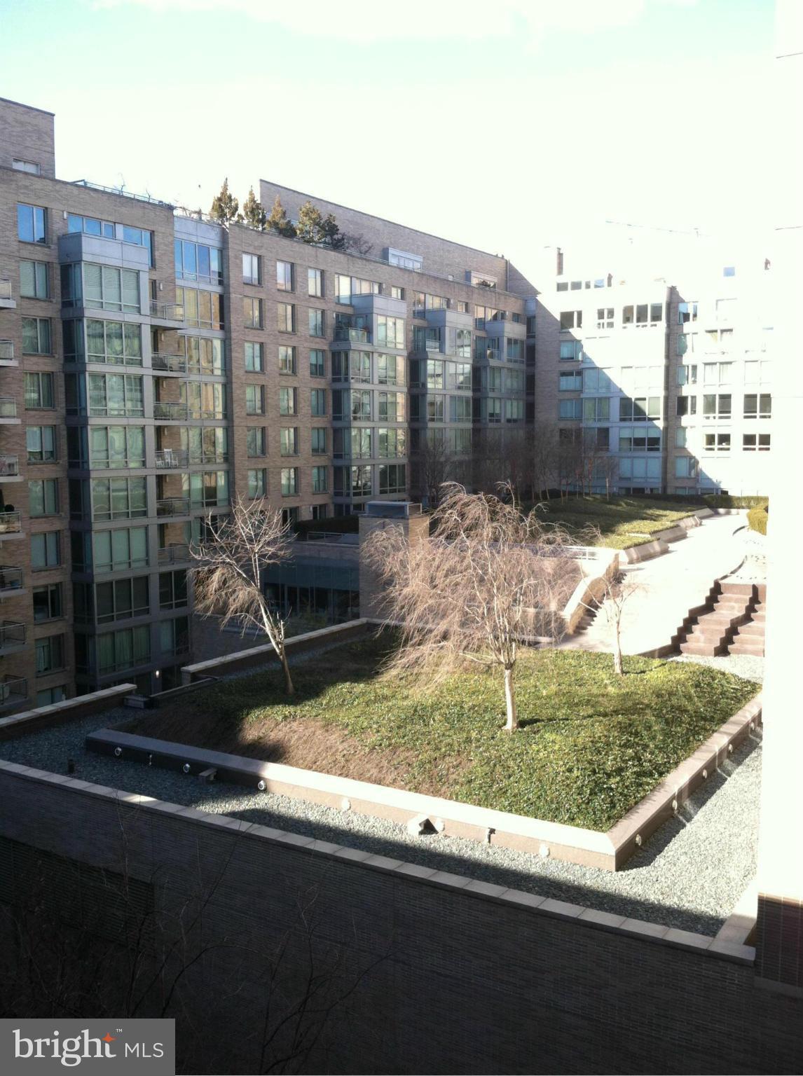 2201 L Street Northwest, Unit 820 Washington, DC 20037 - Photo 12 of 12 a view of swimming pool from a balcony