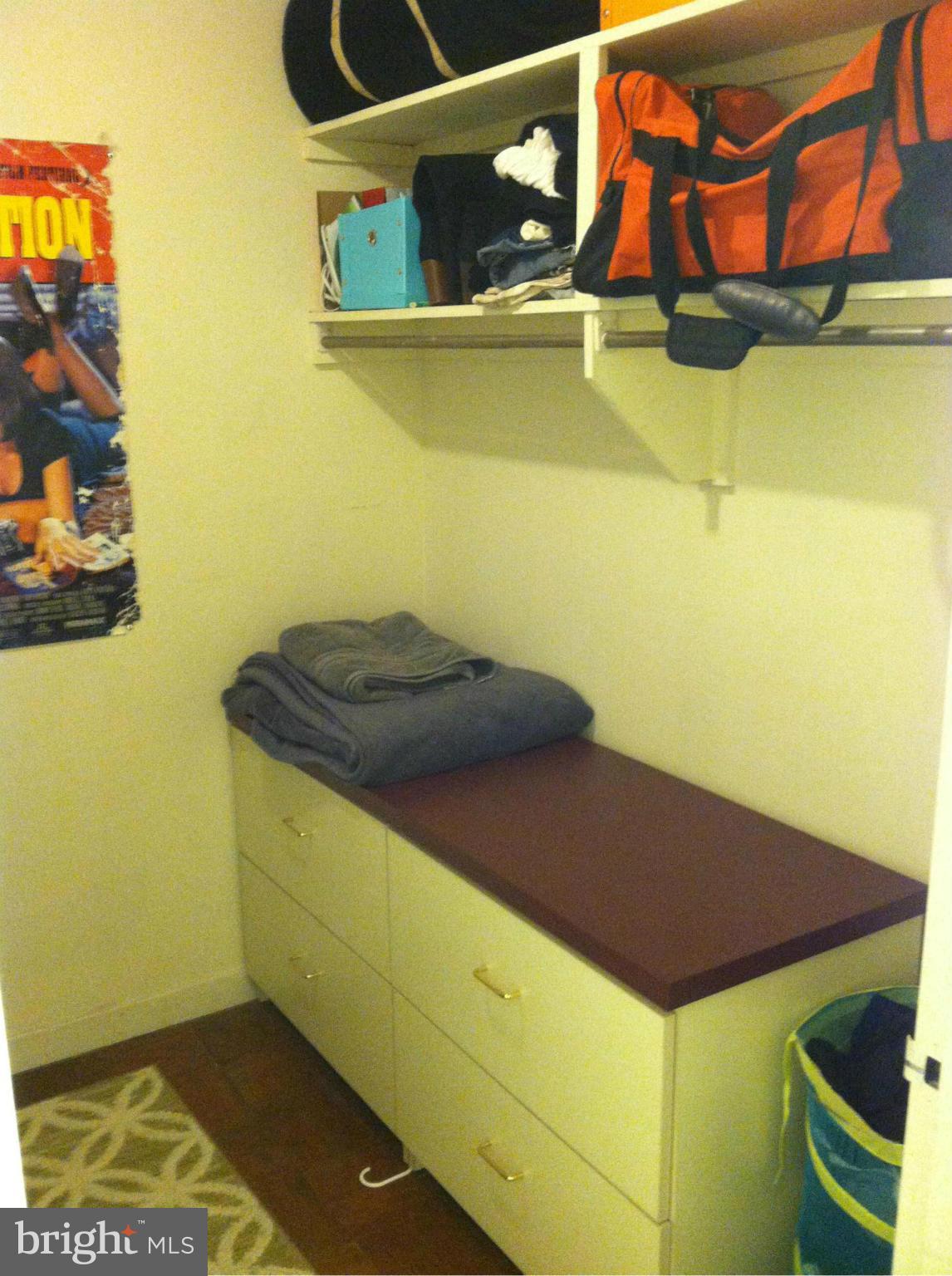 2201 L Street Northwest, Unit 820 Washington, DC 20037 - Photo 4 of 12 a view of walk in closet