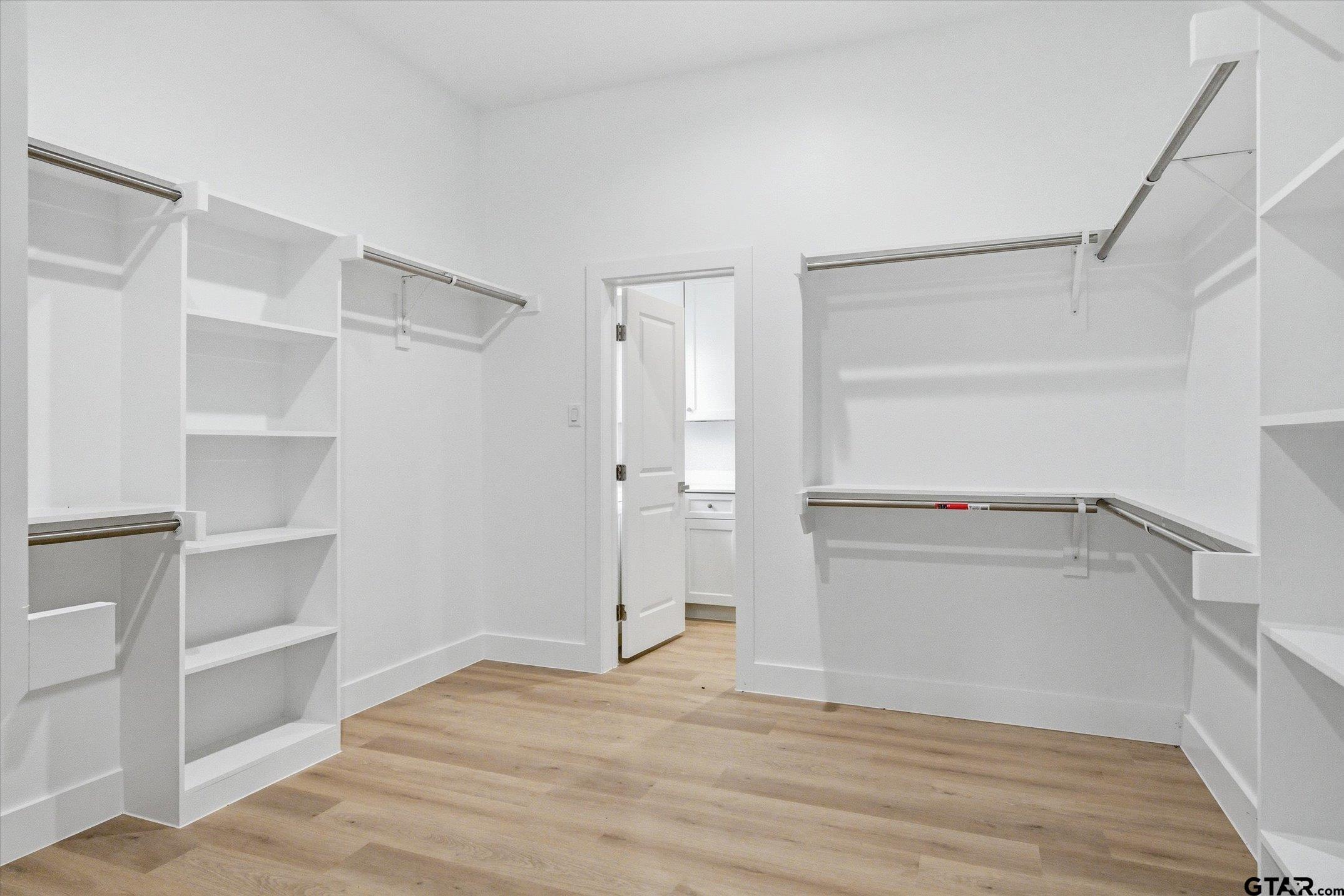 340 Dalton Road Canton, TX 75103 - Photo 20 of 31 a view of walk in closet with empty racks
