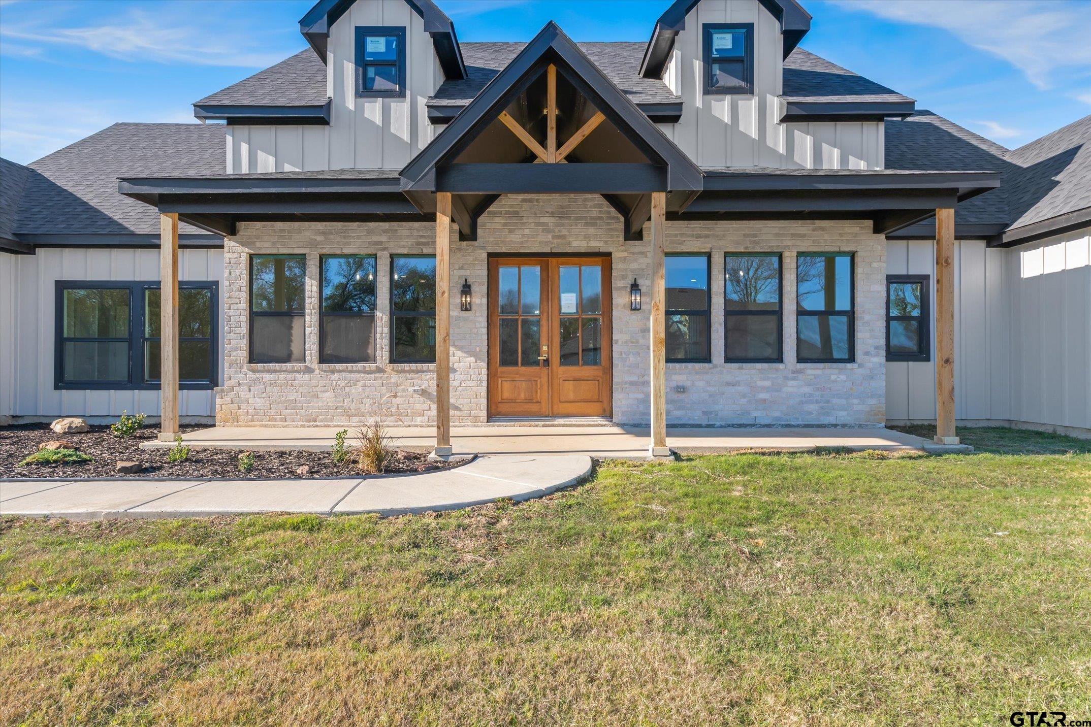 340 Dalton Road Canton, TX 75103 - Photo 2 of 31 a front view of a house with garden
