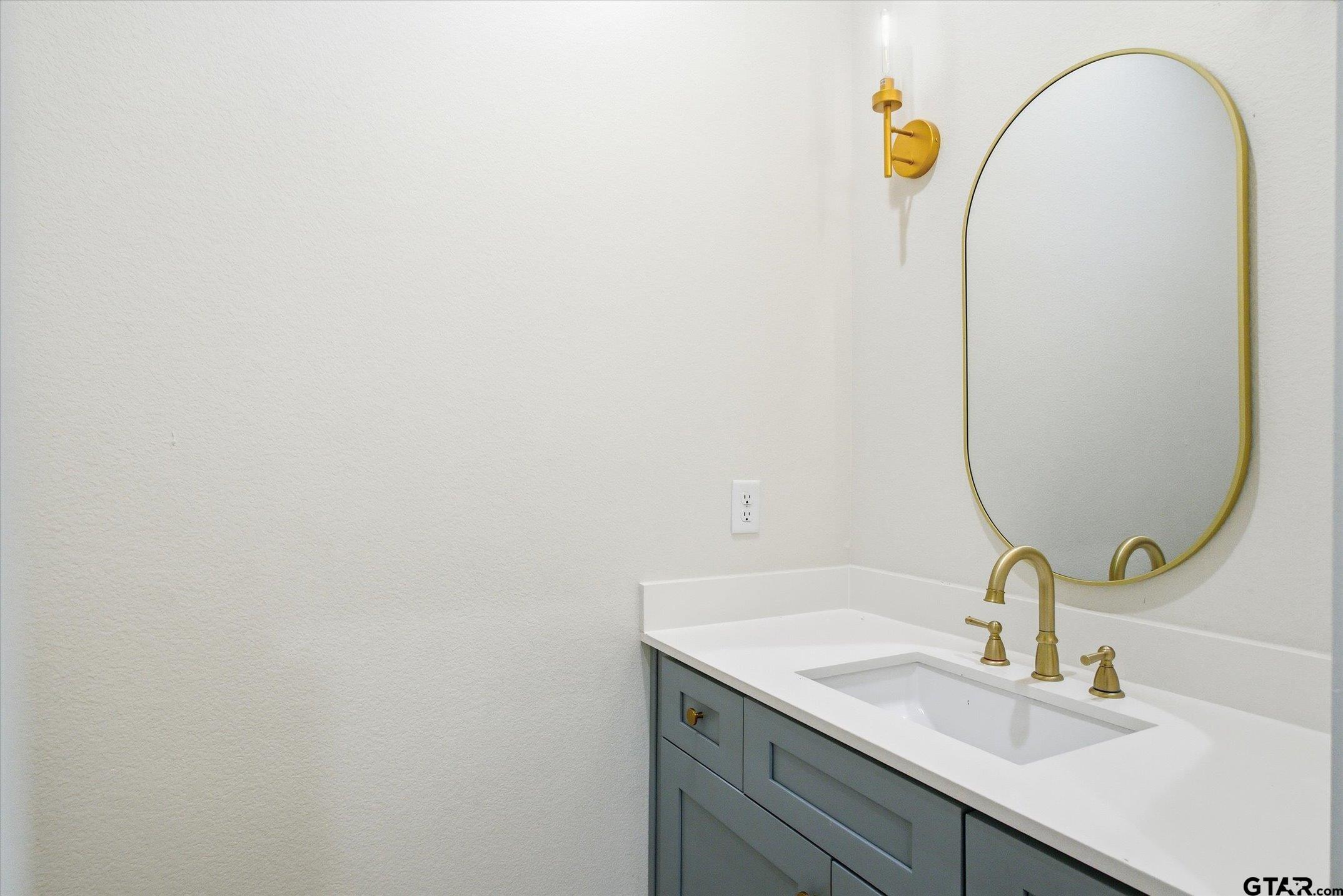 340 Dalton Road Canton, TX 75103 - Photo 21 of 31 a bathroom with a sink and a mirror