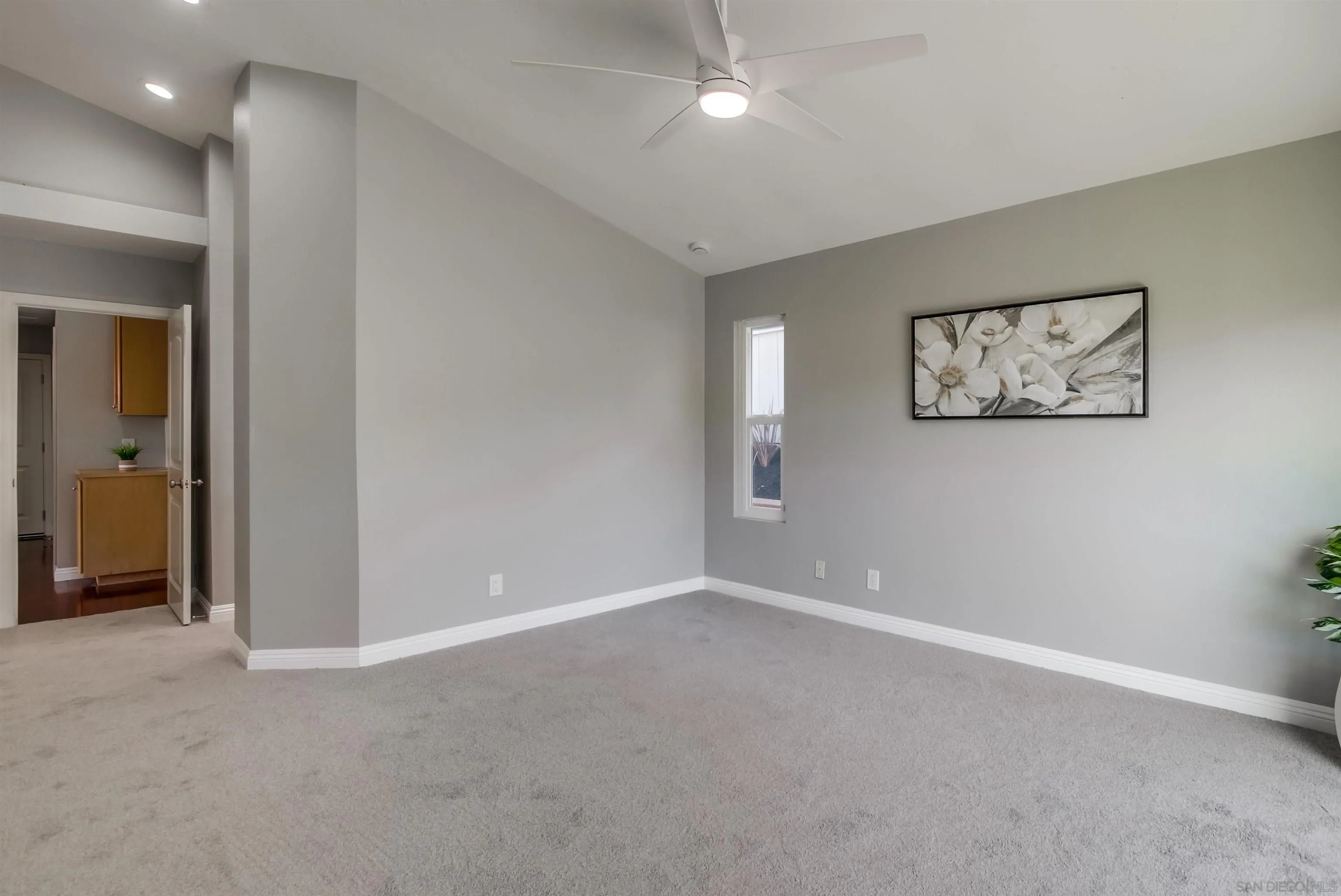 14150 Carmel Ridge Road San Diego, CA 92128 - Photo 11 of 21 a view of an empty room with a window