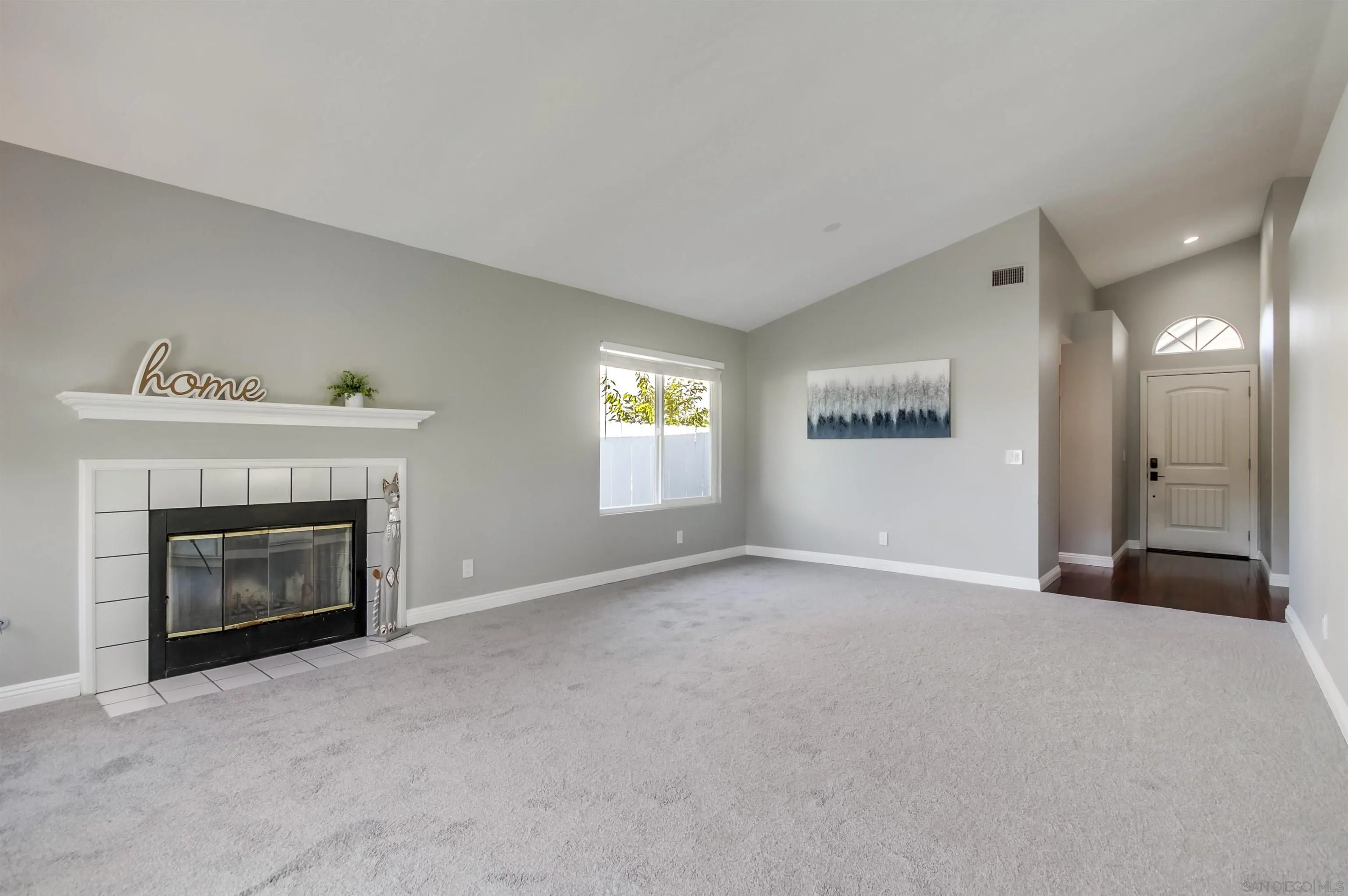14150 Carmel Ridge Road San Diego, CA 92128 - Photo 5 of 21 a view of empty room with a fireplace