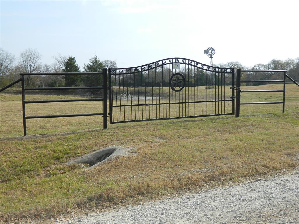 956 County Road 4231 Bonham, TX 75418 - Photo 24 of 25 a view of a fence