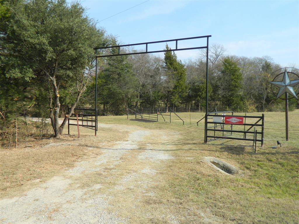 956 County Road 4231 Bonham, TX 75418 - Photo 4 of 25 a view of a basket ball ground
