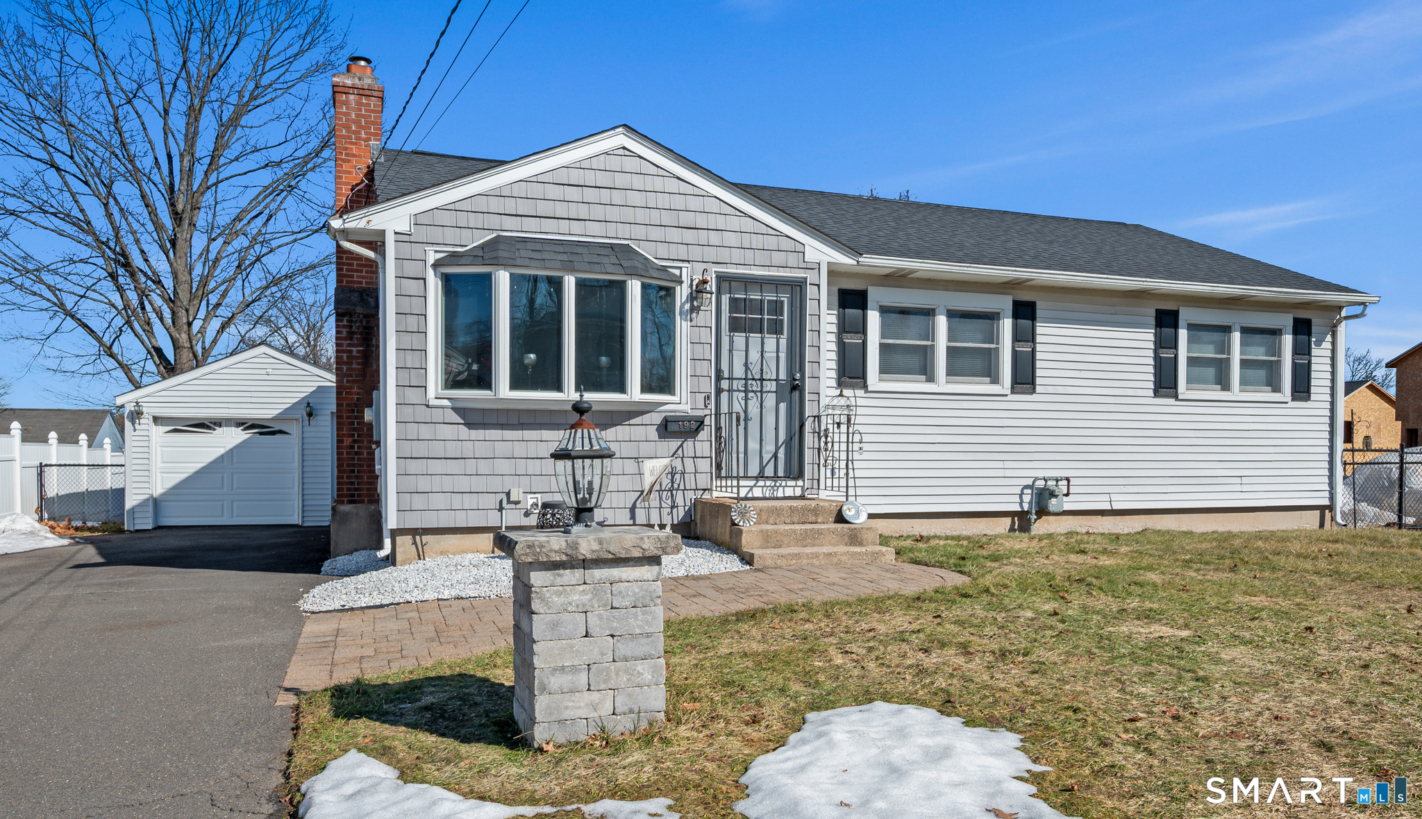 192 Wolcott Hill Road Wethersfield, CT 06109 - Photo 1 of 35 a front view of a house with garden