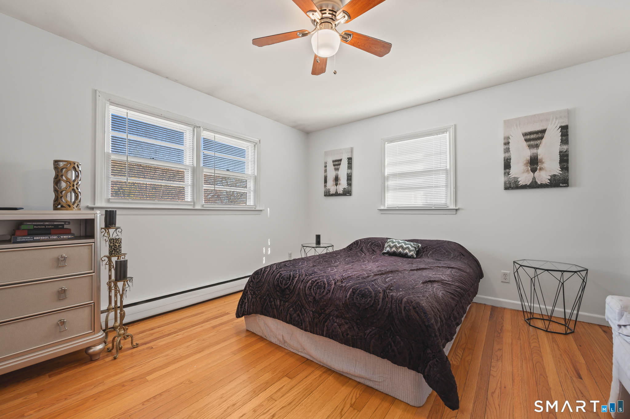 192 Wolcott Hill Road Wethersfield, CT 06109 - Photo 14 of 35 a bedroom with a bed and window
