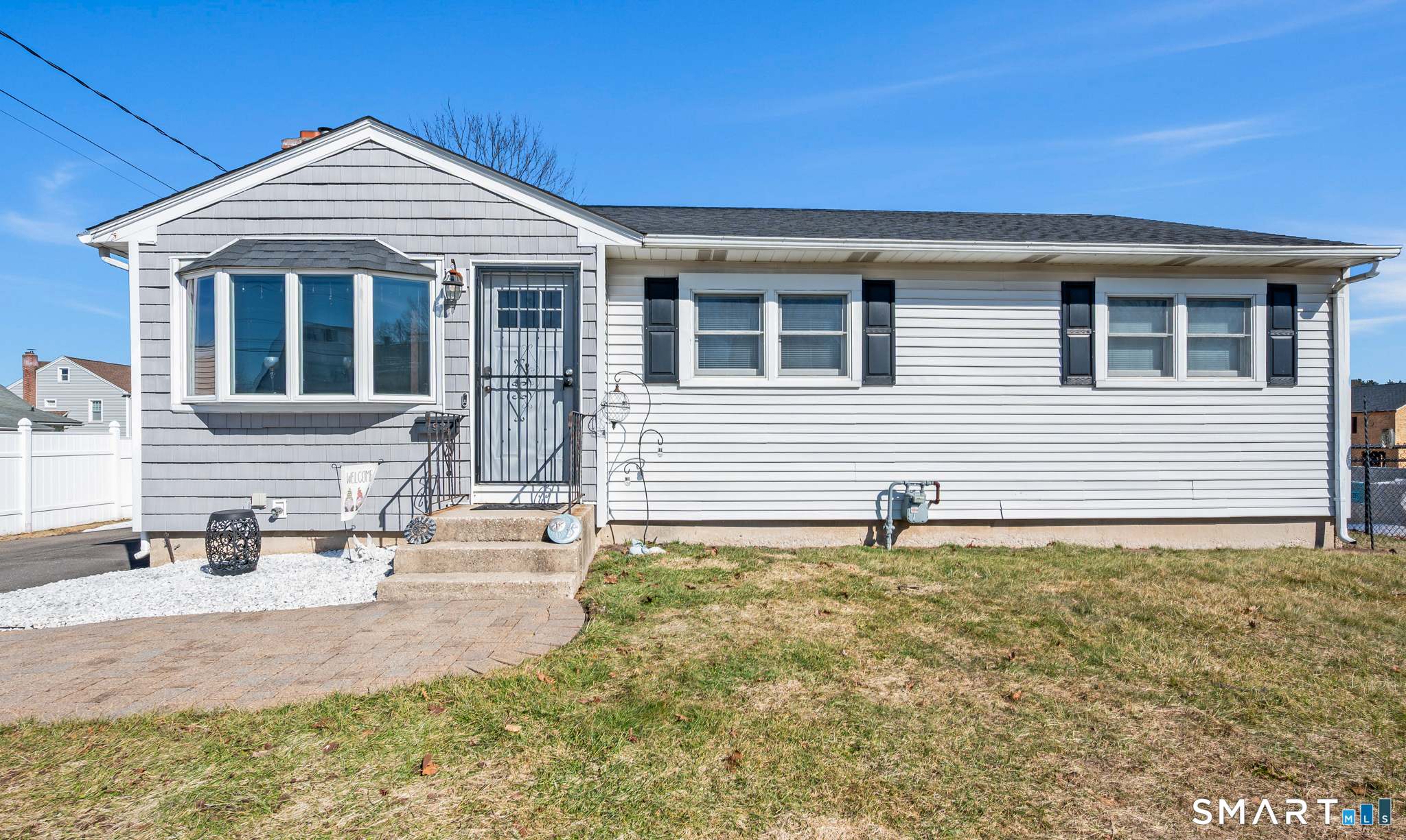 192 Wolcott Hill Road Wethersfield, CT 06109 - Photo 34 of 35 a front view of a house with a yard