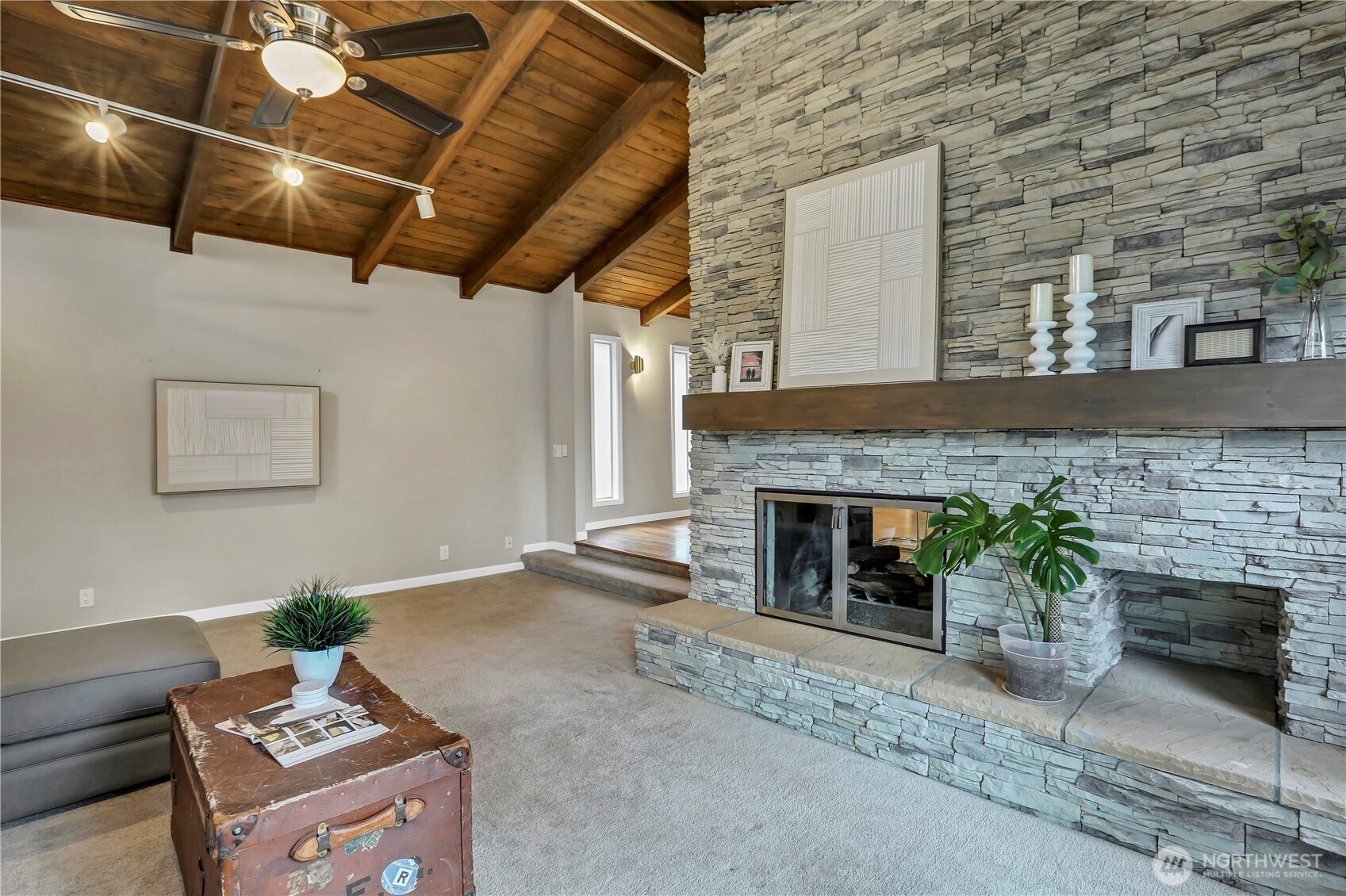 16387 129th Avenue Southeast Renton, WA 98058 - Photo 15 of 30 a living room with furniture and a fireplace