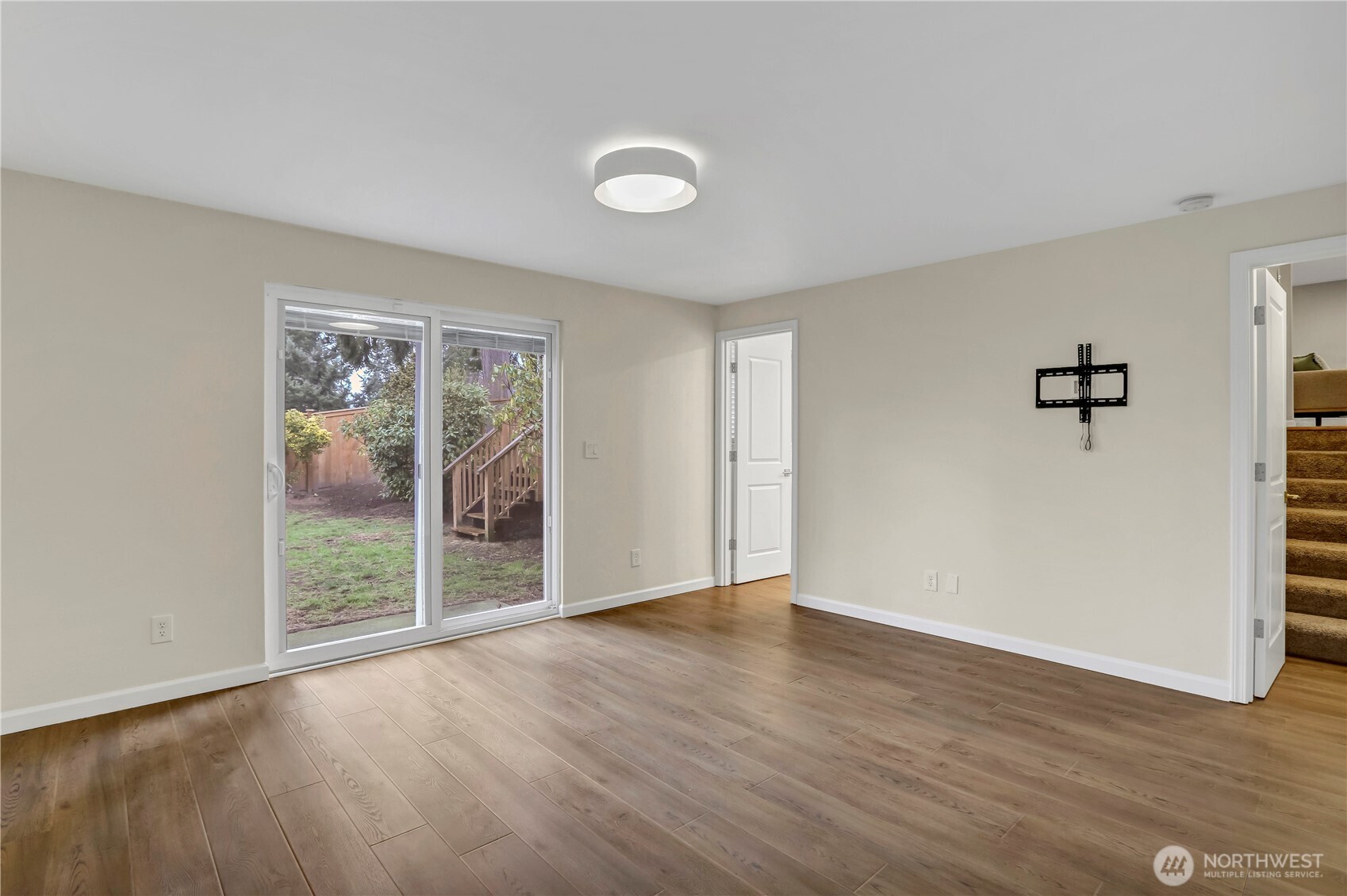 16387 129th Avenue Southeast Renton, WA 98058 - Photo 18 of 30 wooden floor in an empty room