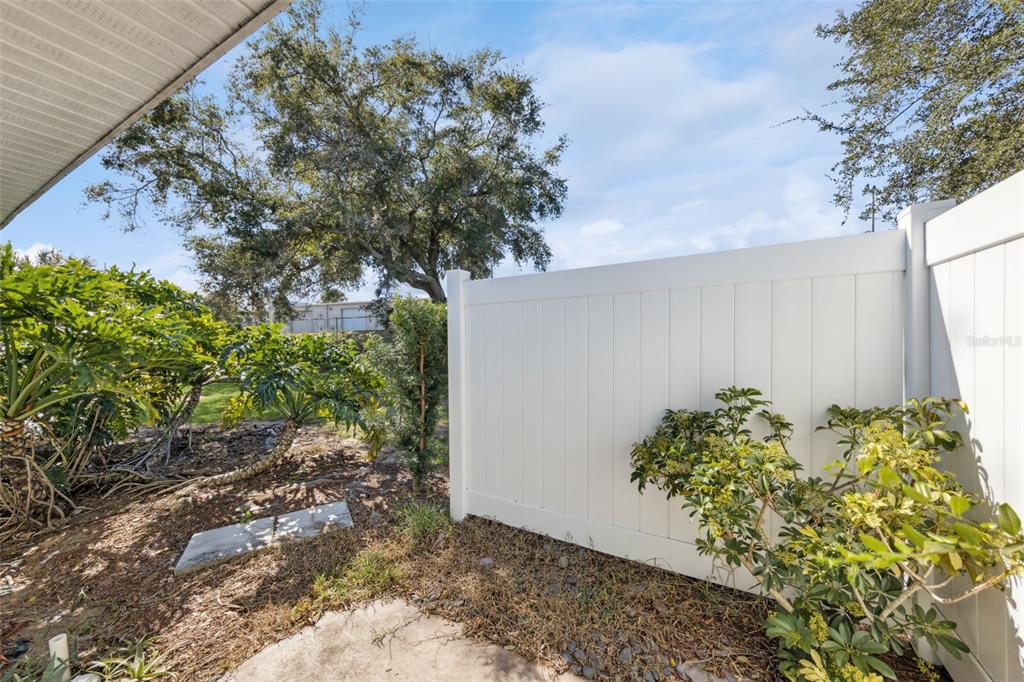 212 Ridge Crest Loop, Unit B Minneola, FL 34715 - Photo 21 of 21 a view of a plants with large trees