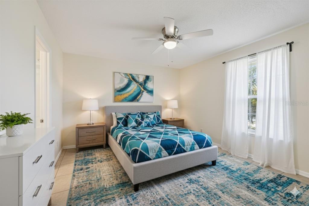 212 Ridge Crest Loop, Unit B Minneola, FL 34715 - Photo 10 of 21 a living room with furniture and a window