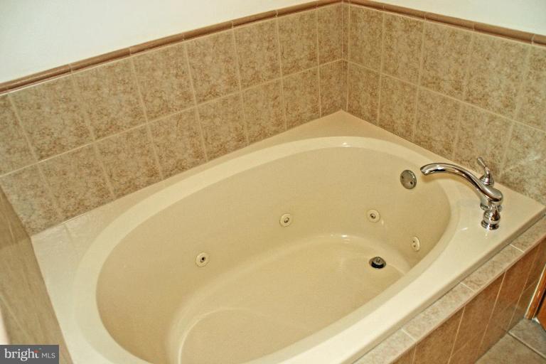 8002 Quarterfield Road Severn, MD 21144 - Photo 14 of 30 Whirlpool tub of Master Bath