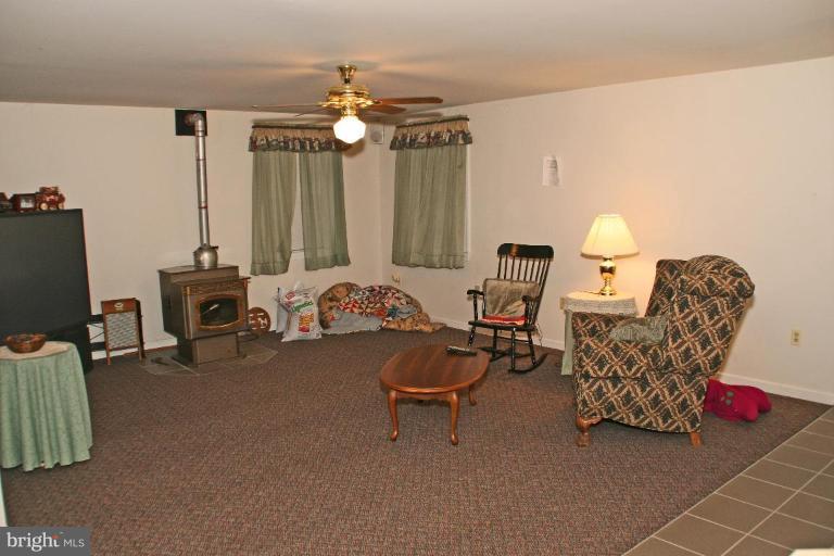 8002 Quarterfield Road Severn, MD 21144 - Photo 22 of 30 Additional space in the lower level.