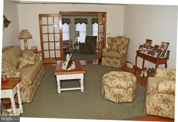 8002 Quarterfield Road Severn, MD 21144 - Photo 5 of 30 living area adjacent to family room