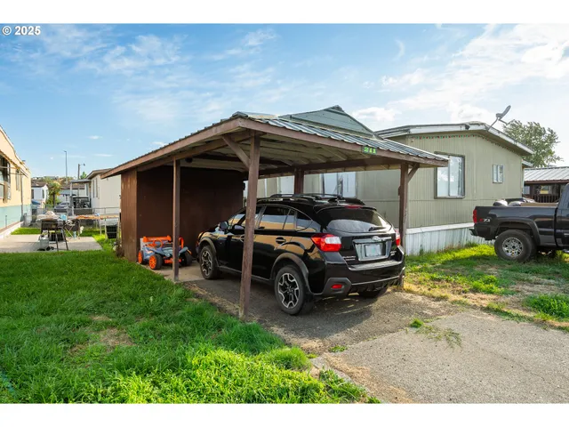 a view of a car in front of house