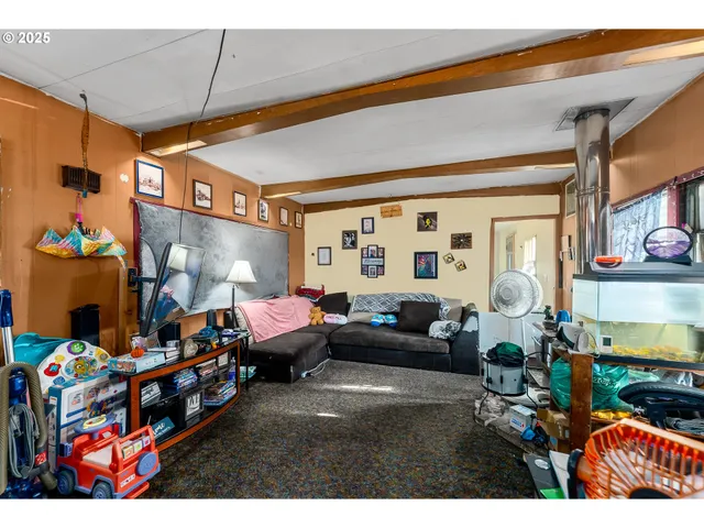 a living room filled with furniture and a couch