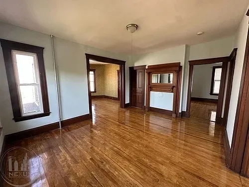 a view of livingroom with hardwood floor and window