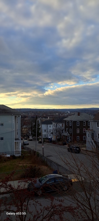 30 Pattison Street, Unit 2 Worcester, MA 01604 - Photo 5 of 32 a view of a swimming pool with an outdoor seating