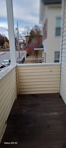 a view of a balcony with an outdoor space