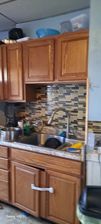 30 Pattison Street, Unit 2 Worcester, MA 01604 - Photo 10 of 32 a close view of sink and microwave