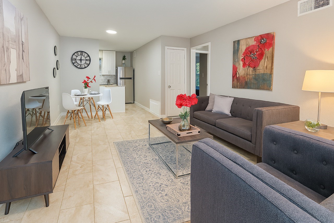 3316 North MacGregor Way, Unit 4 Houston, TX 77004 - Photo 1 of 37 a living room with furniture and a flat screen tv