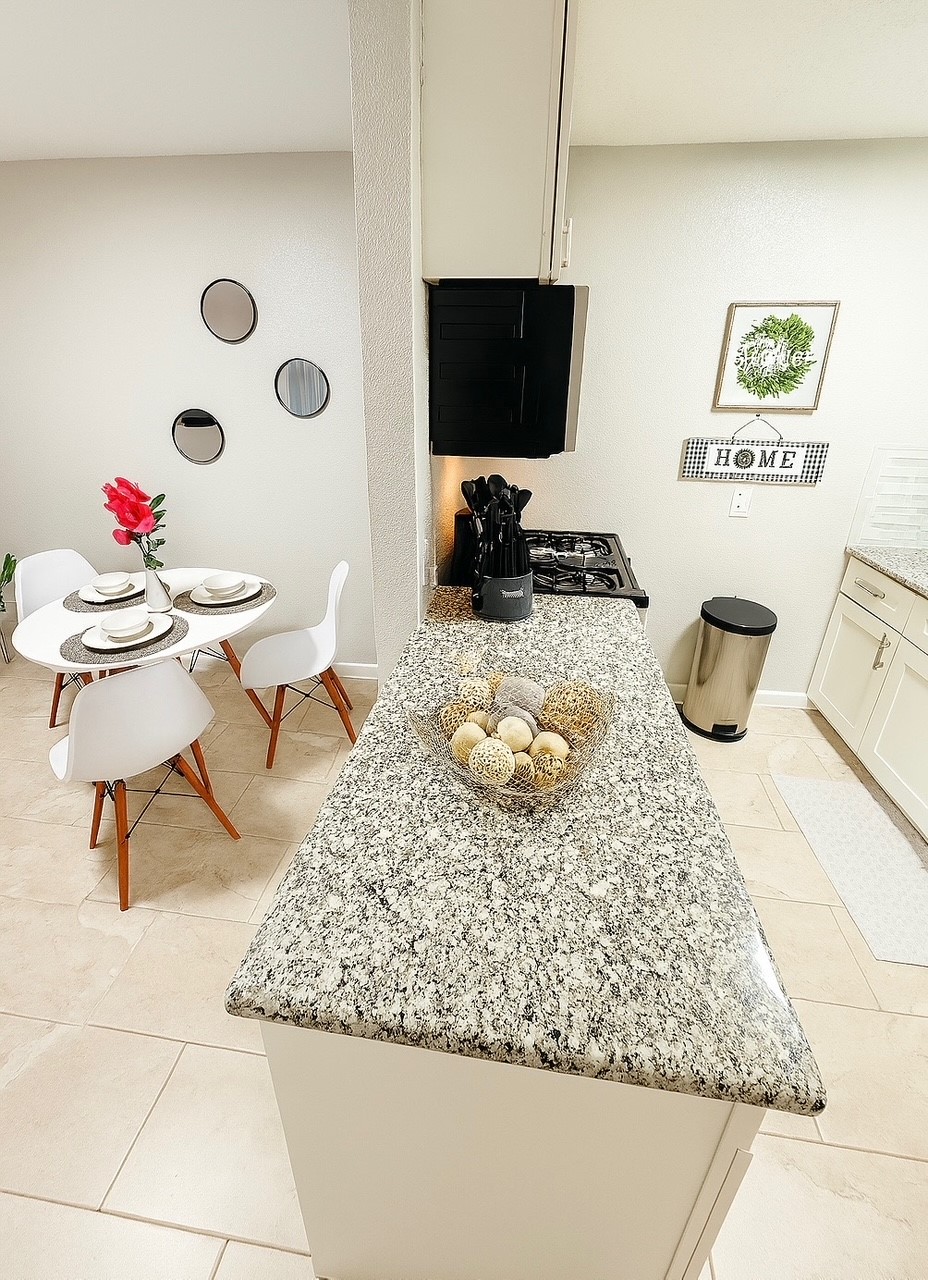 3316 North MacGregor Way, Unit 4 Houston, TX 77004 - Photo 7 of 37 a living room with furniture and a flat screen tv