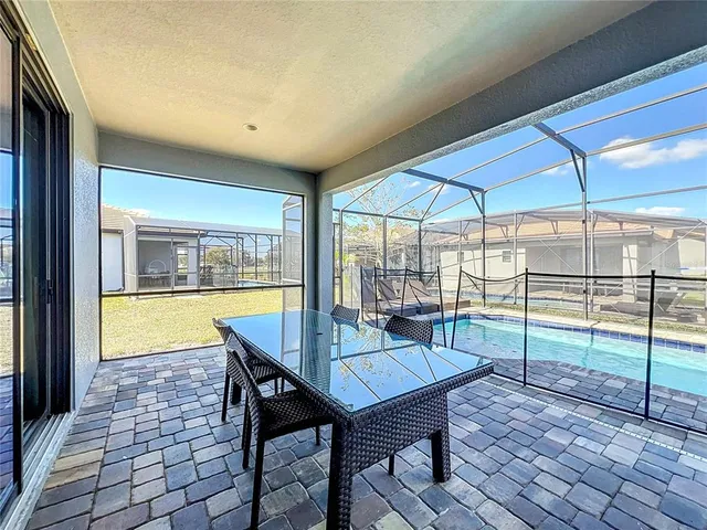 a view of a swimming pool and outdoor space