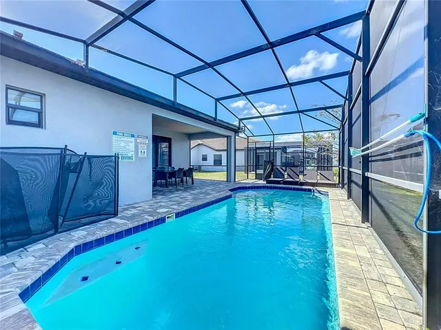 a view of residential houses with outdoor space