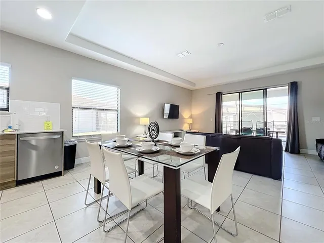 a view of a dining room with furniture