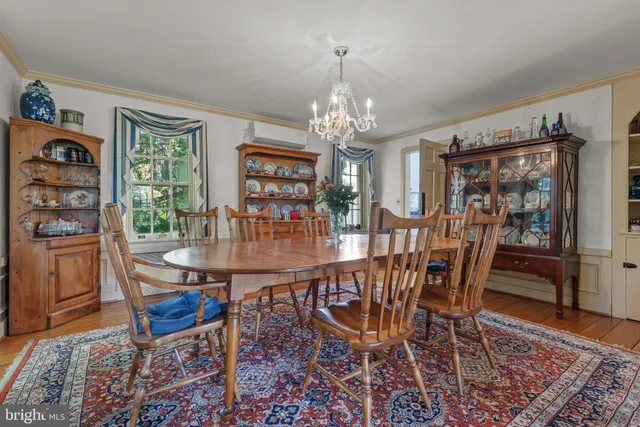 a bedroom with a bed and a fireplace