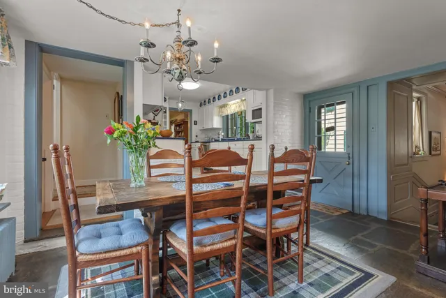 a white refrigerator freezer sitting in a kitchen