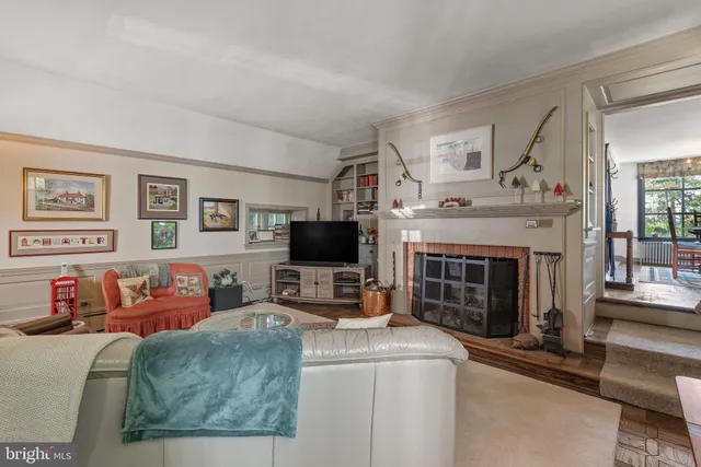 a white toilet sitting next to a shower curtain