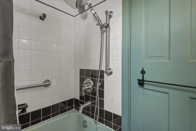 a view of a house with a small yard and plants