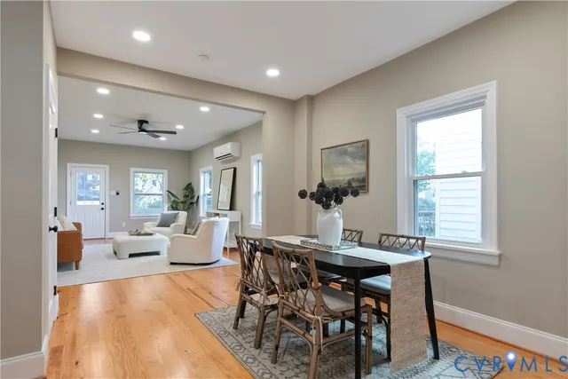 a bedroom with a bed and a dresser in it