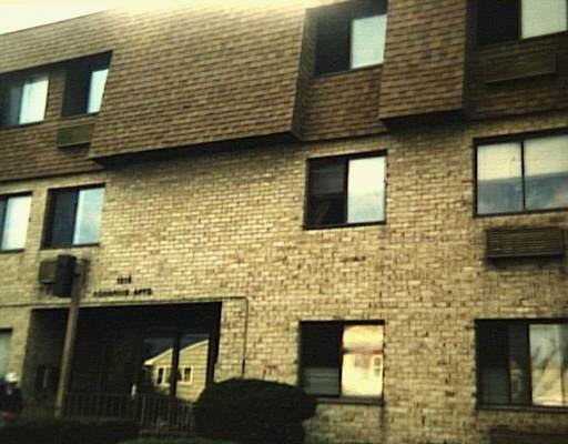 1315 Noble Avenue, Unit C8 Bridgeport, CT 06608 - Photo 1 of 1 a brick house with a brick wall