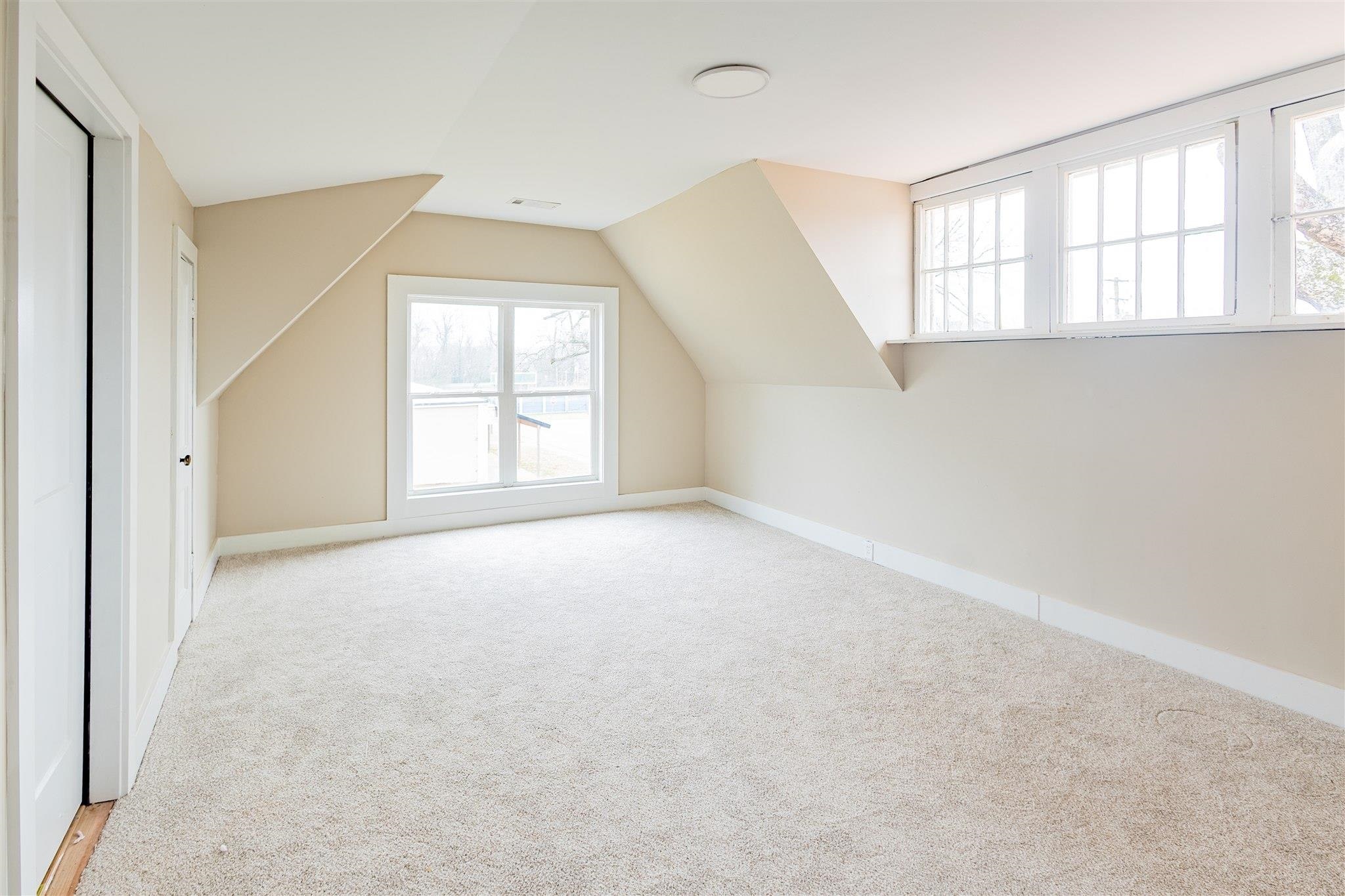 129 Warren Avenue Selmer, TN 38375 - Photo 10 of 28 an empty room with a windows and closet