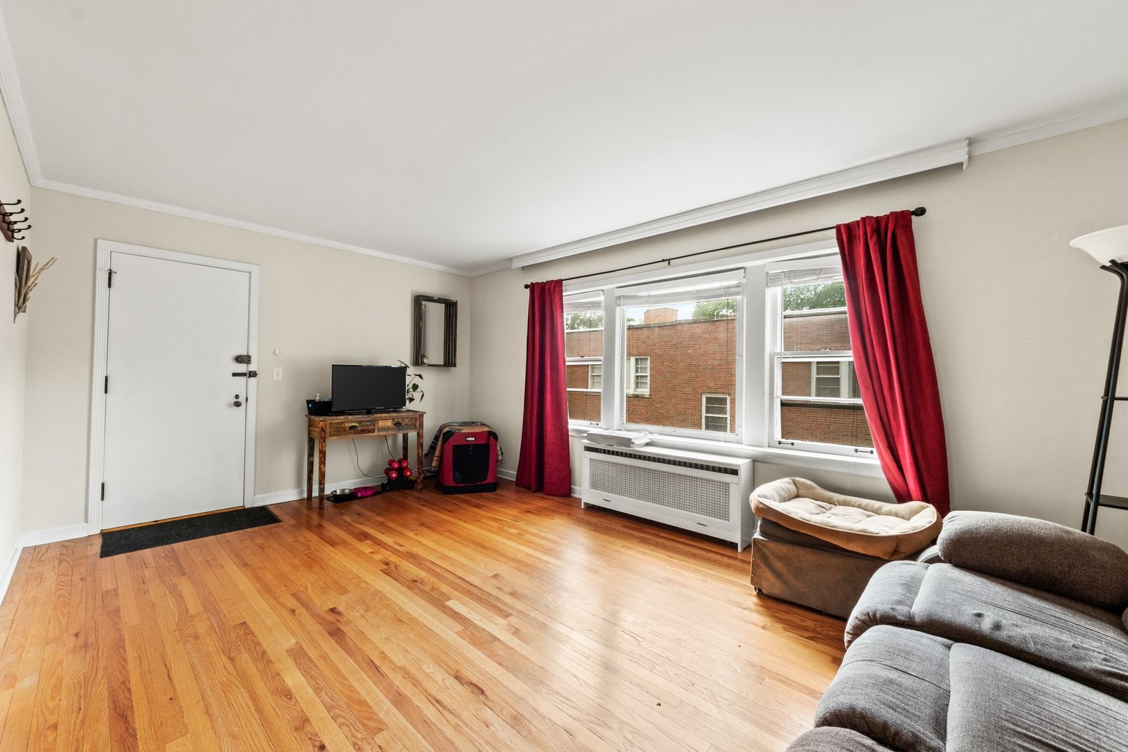 1408 Central Street, Unit 3N Evanston, IL 60201 - Photo 4 of 17 a living room with furniture and a large window