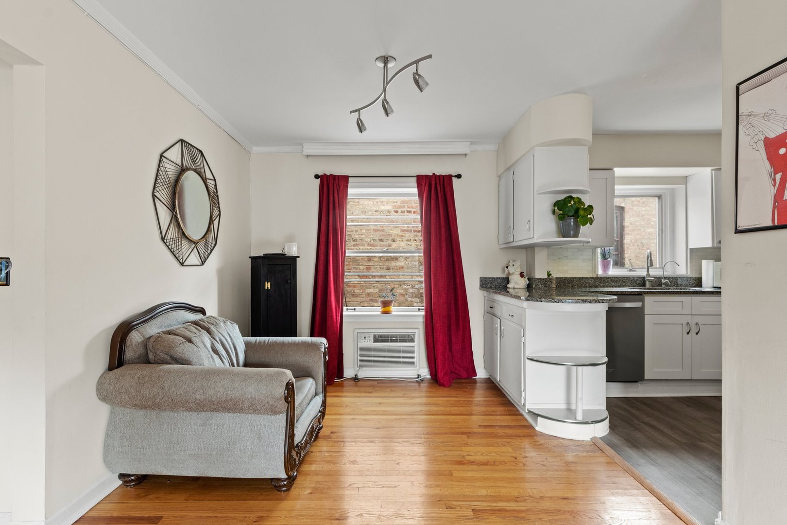 1408 Central Street, Unit 3N Evanston, IL 60201 - Photo 5 of 17 a living room with furniture and a large window